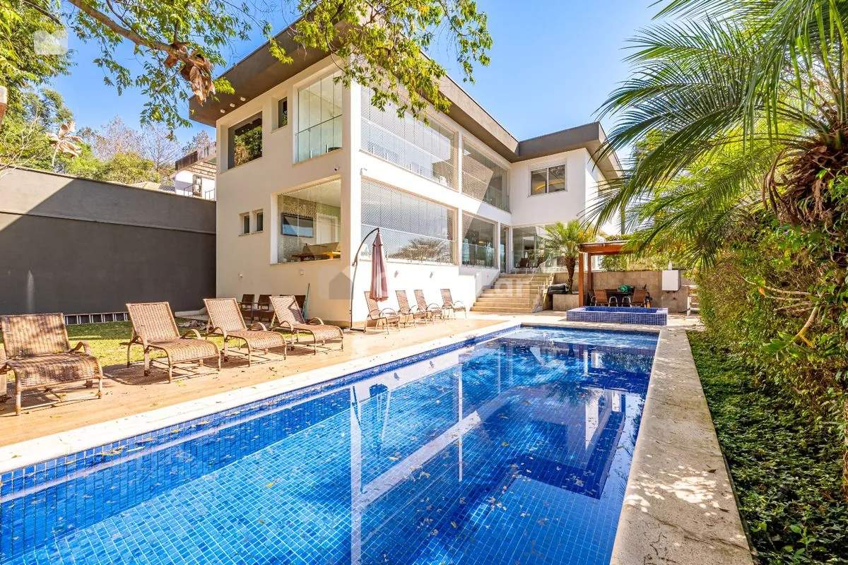 Casa porteira fechada à venda no Tamboré 11 com 6 suítes