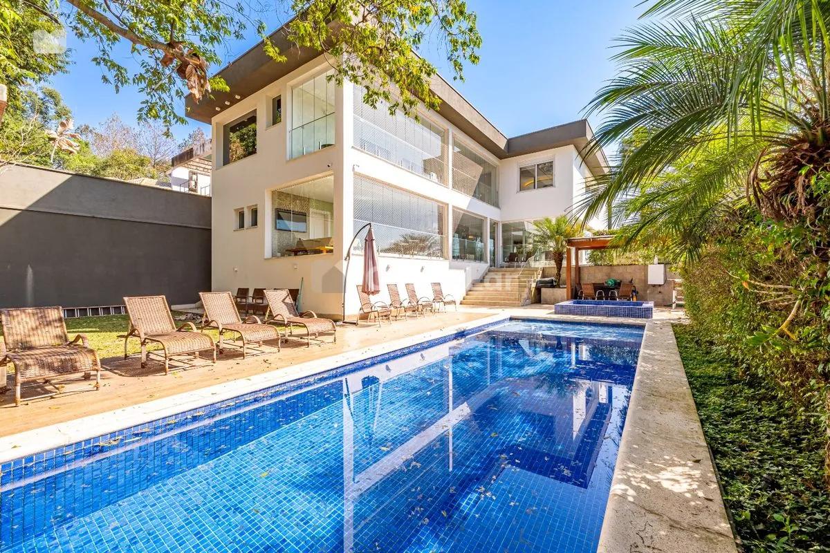 Casa porteira fechada à venda no Tamboré 11 com 6 suítes